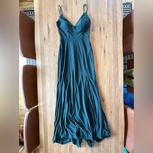 Forest green floor length mermaid cut dress with slit